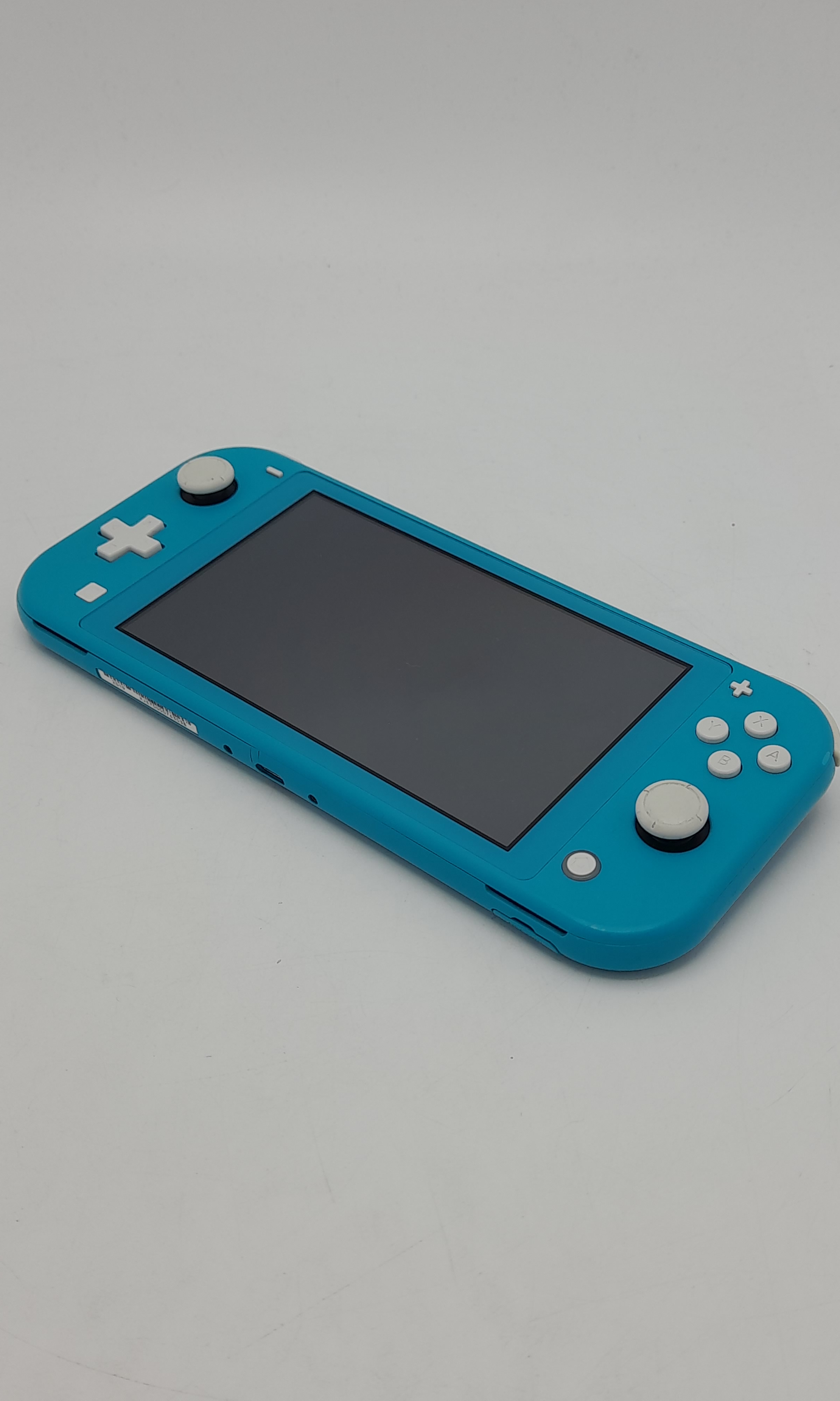Foto van Nintendo Switch Lite Turquoise - Mooi