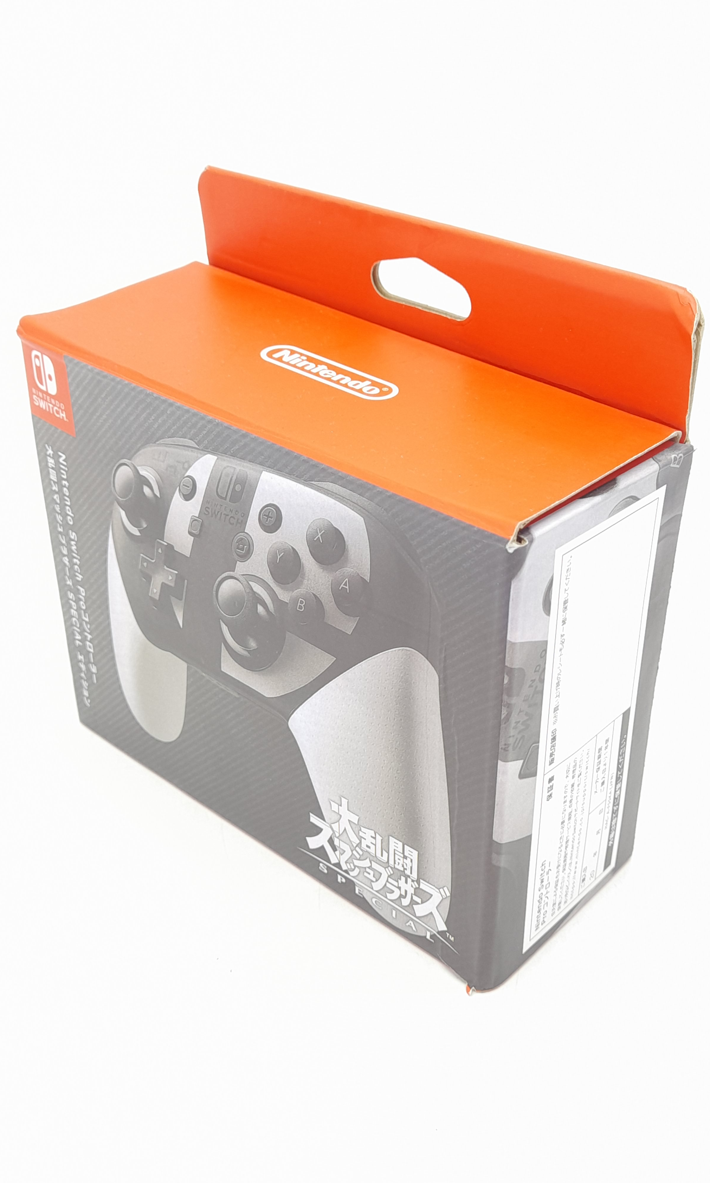 Foto van Nintendo Switch Pro Controller Super Smash Bros. Ultimate Editie in Doos