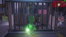 Review Luigi’s Mansion 3: Gooigi vergezelt je tijdens je avontuur en kan van pas komen in puzzels. Hij kan bijvoorbeeld door tralies lopen!